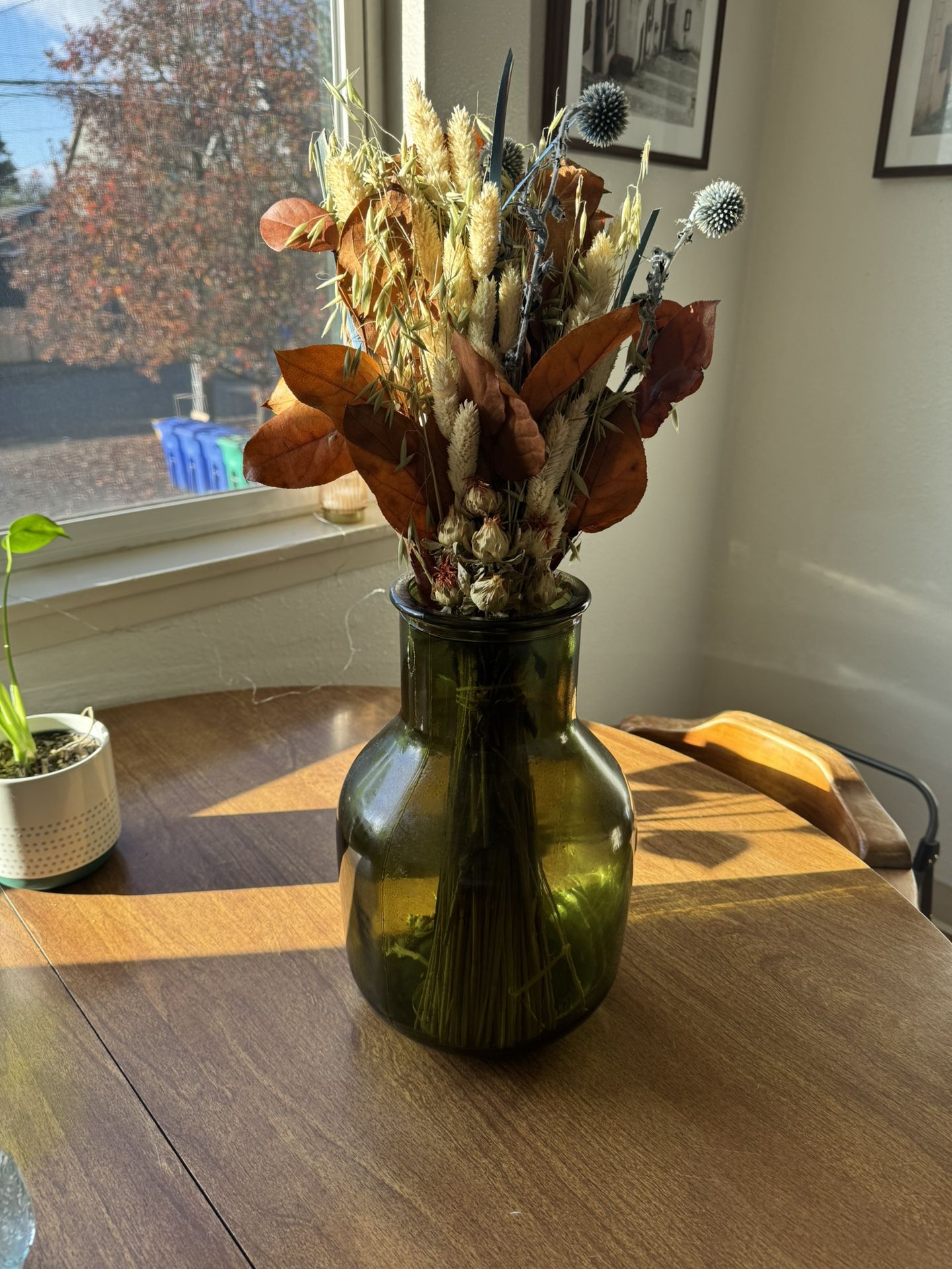 Green Vase And Dried Flower Bouquet
