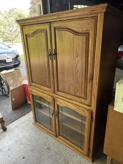 NEED GONE BEAUTIFUL ALL WOOD CHINA CABINET WITH GLASS AND COLLAPSING DOORS