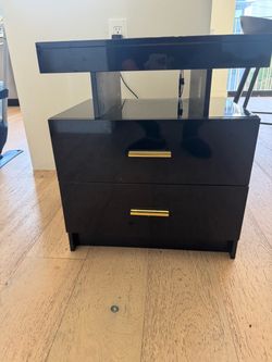 Black LED nightstand with wireless charging and drawers