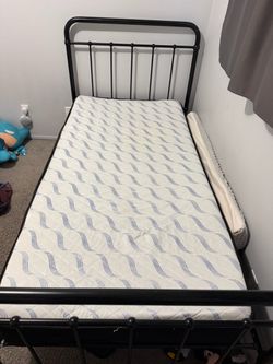 Twin size metal frame with mattress