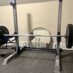 Squat Rack w/ Olympic Barbell & Weight Plates – Home Gym Setup
