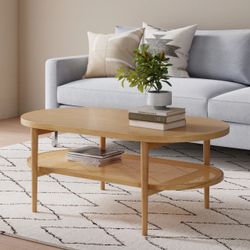 Nathan James Oval Wood Coffee Table with Rattan Shelf