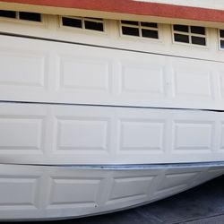 Garage door and rollers