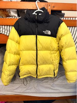 Yellow North Face puffer
