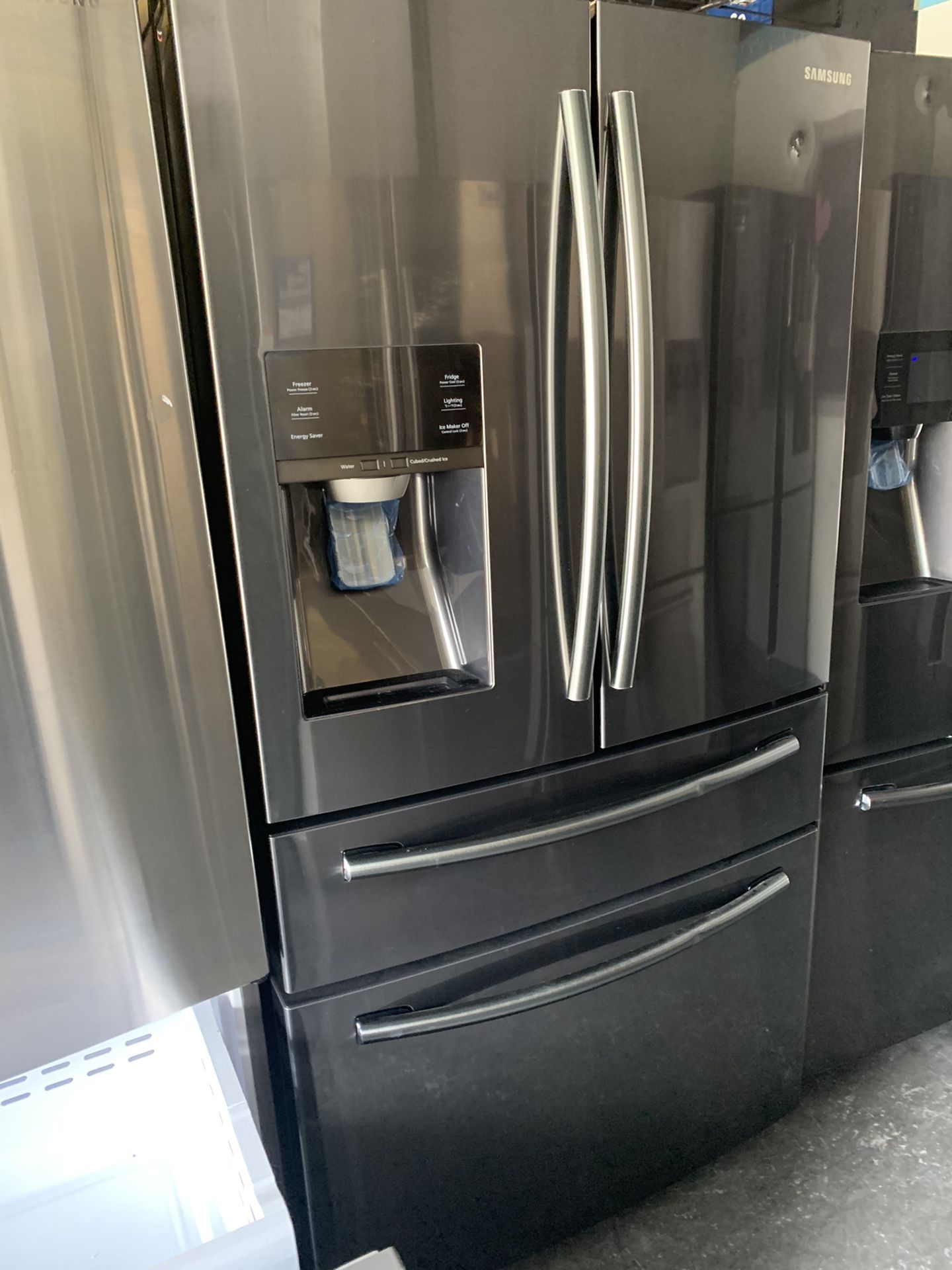 Black stainless four door refrigerator