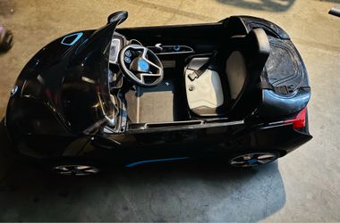 Electric Car Ride on for kids with charger included.