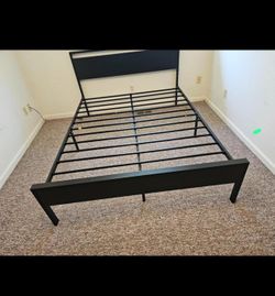 Allewie Queen sized platform bed frame with headboard