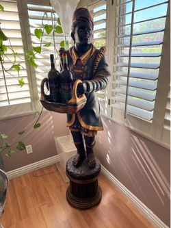 Pair of antique Blackamoor statues made of wood