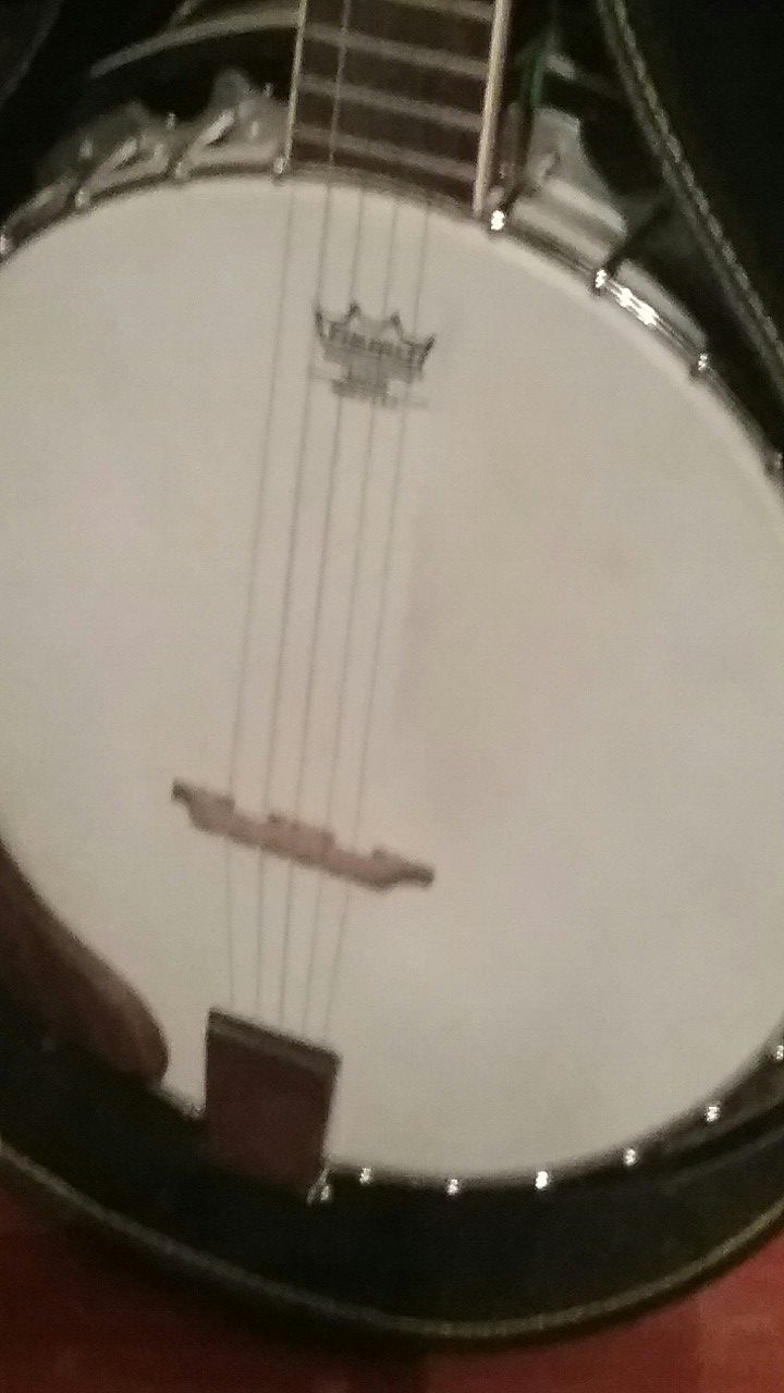 Banjo with a Hard Shell case