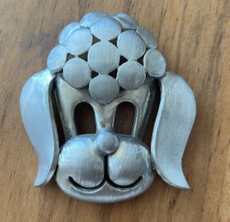 Pierre Cardin Iconic poodle head pin MCM runway from the 1960's brushed pewter sigened