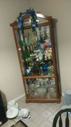 Lighted Vintage Display Cabinet With Lots Of Collectible Vintage Glass And Silverware