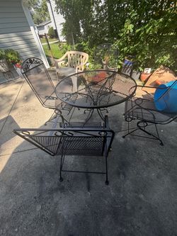 Metal table42” and 4 chairs