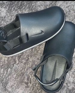 Dark Smoke Grey Nike calm mules. Mens size 7 women's size 8. Firm price. Bought for $65. Pick up. I'll take Cash or Cash App. Worn lightly 2x.