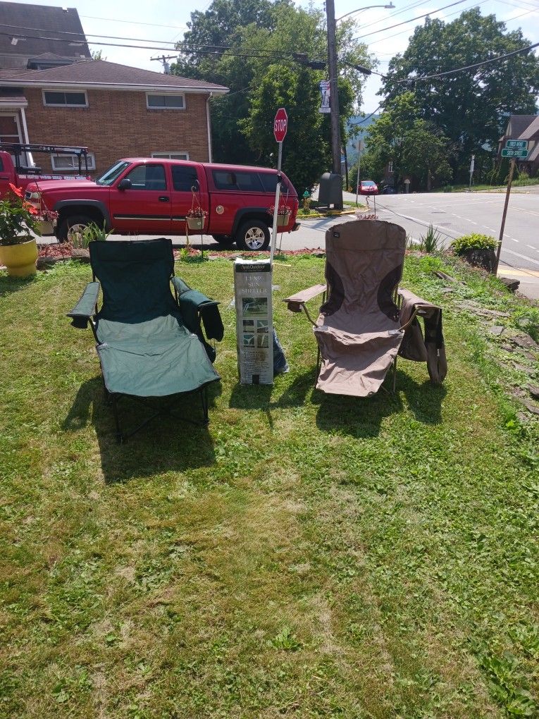 Camping Chairs And Sun Shelter With Bags For The Chair's