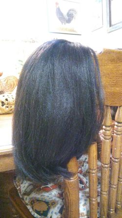 One shorter dark wig for 10 dollars it is in good condition