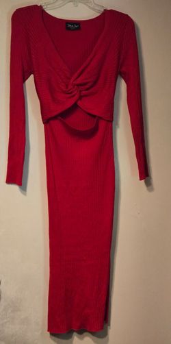 A red dress with front opening long sleeves