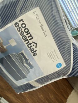 Queen size bed and a bag