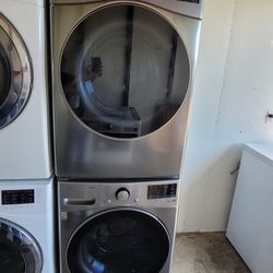 New LG ThinQ Front Loading Washer And New LG Stackable Gas Dryer Set In Graphite Steel Stainless Steel 
