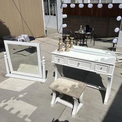 Vanity with mirror and chair