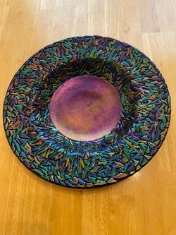 Decorative round dish.