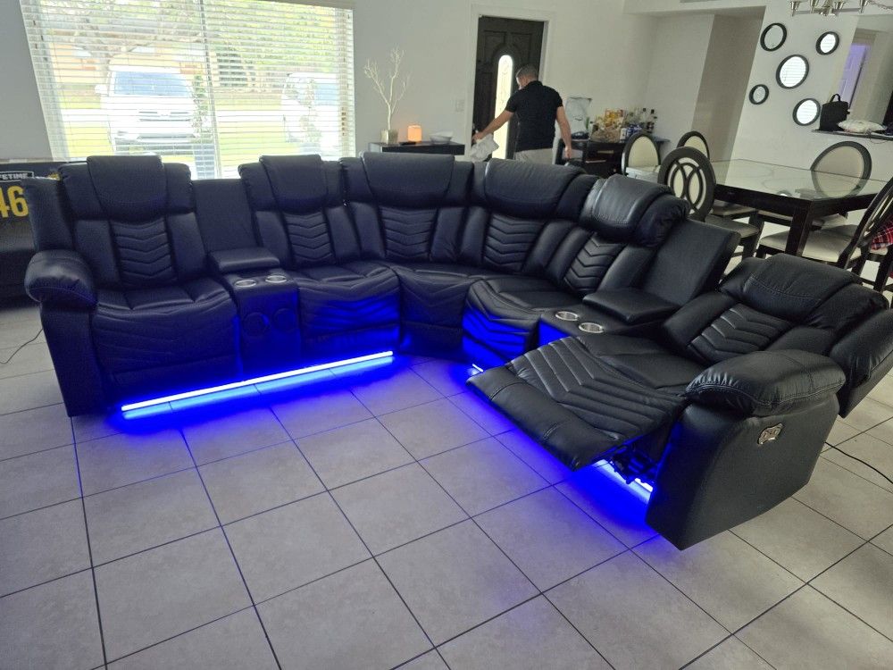 POWER RECLINING SOFA WITH LED LIGHTS, USB PORTS, SPEAKERS, CUPHOLDERS AND ARM STORAGE