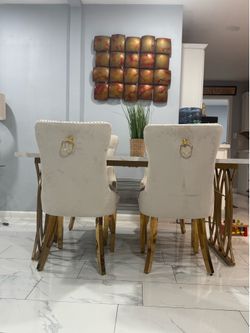 Dining table and 4 chairs