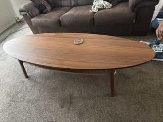 Oval Walnut Coffee Table with Woven Shelf
