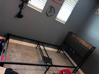 $80 for 2 twin bed frames with outlets