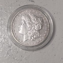Beautiful 1878-CC Morgan Silver Dollar. VAM-6. Top 100 Variety. Doubled Die Obverse, Doubled Leaves Dollar with 7 tail feathers.