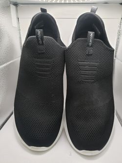 Size 8.5 pair of black Skechers slip-on walking sneakers