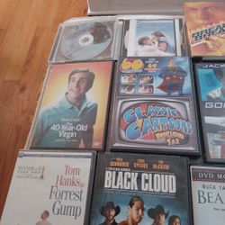 14 Dvd's And 2 DVD Cleaners 