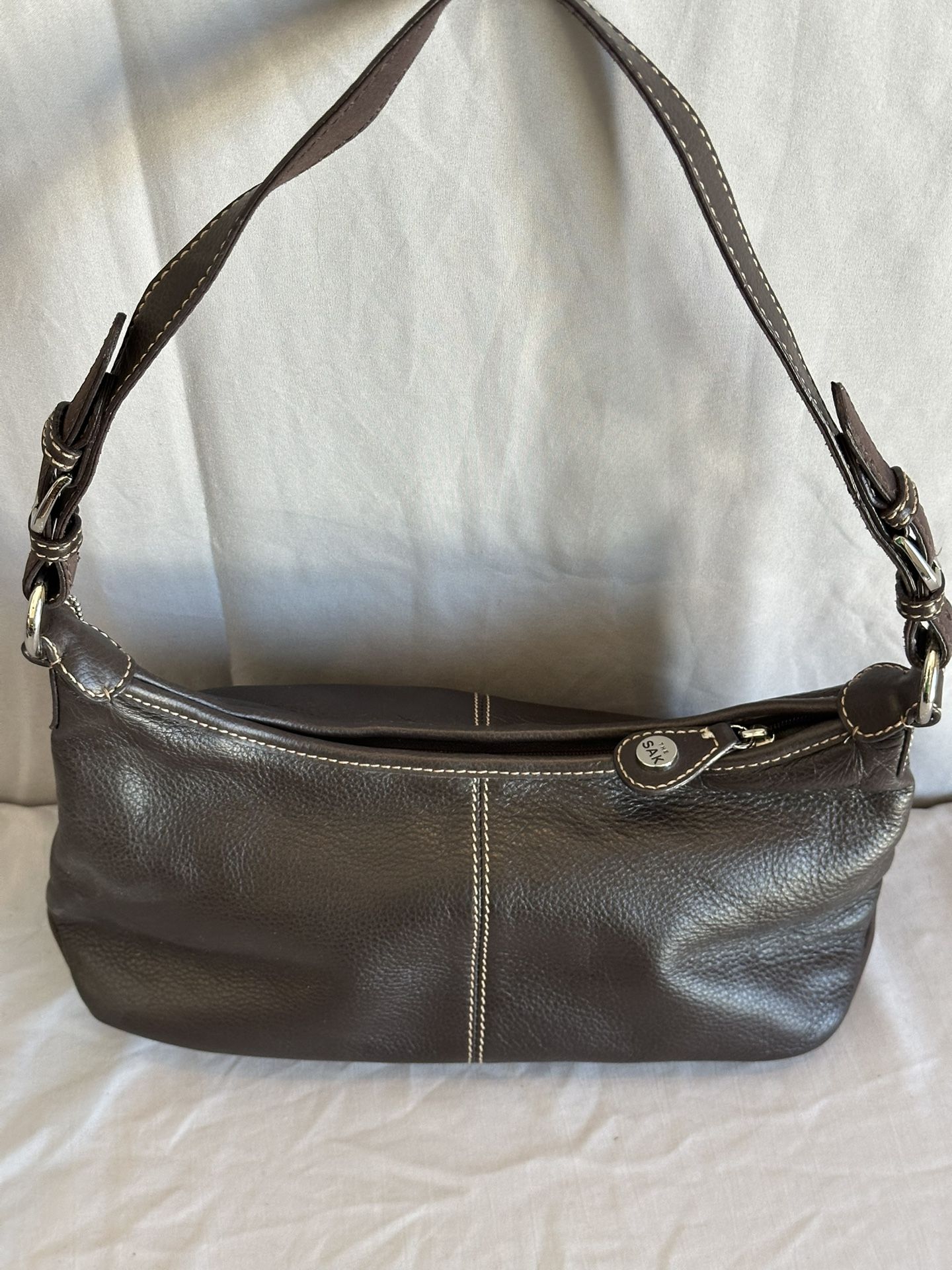 The SAK dark brown leather shoulder bag