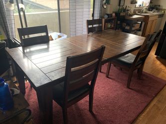 Expandable Dining Table and Chairs.