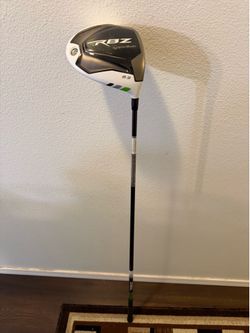 Classic TaylorMade RBZ driver. Loft is 9.5 degrees. Club has black shaft. Grip is black. Regular flex shaft. XCON-5. Right handed.