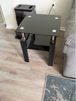 Glass end tables. (2)