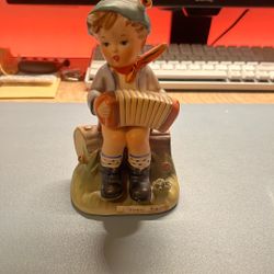 Vintage Collectible Figurine - Boy Playing Accordion on a Log