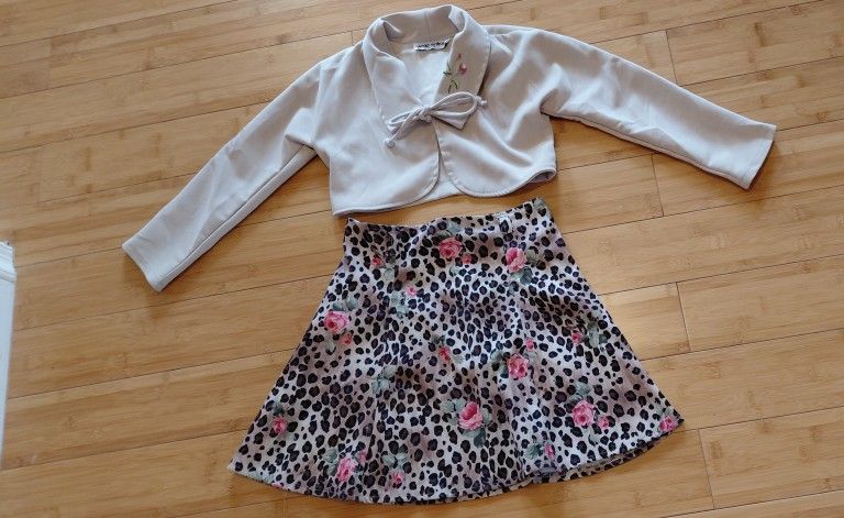 2 peice outfit and 1 skirt with flowers size 12 all $17