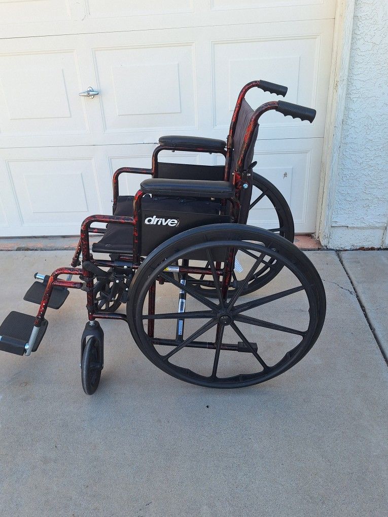 $45 A LIKE NEW DRIVE DELUXE WHEELCHAIR W/LEG & FOOT SUPPORTS