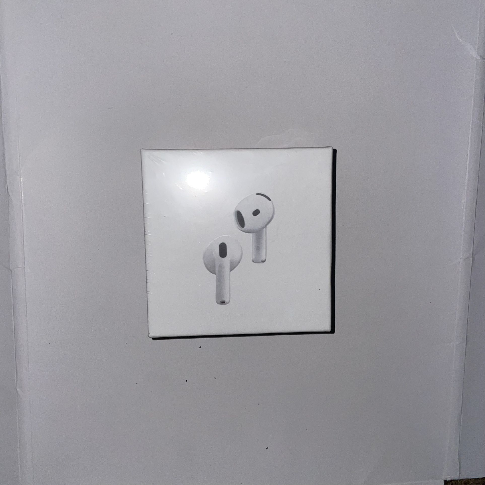 white wireless in-ear bluetooth headphones