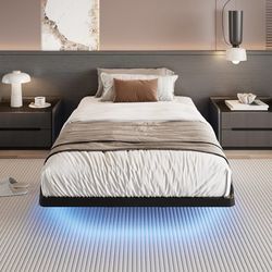 C233 $50  Twin Size Floating Bed Frame with Smart LED Lights, Black Modern Design Metal Platform Bed with Power Strip, No Box Spring Needed, Noise-Fre