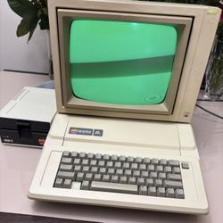 Vintage Apple IIe Computer With Monitor And Floppy Drive