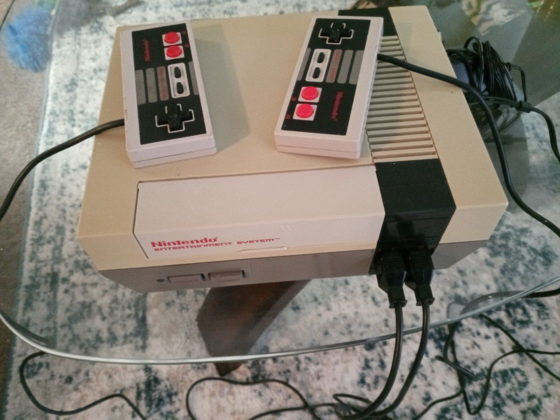 Original Nintendo with 2 controllers and one game