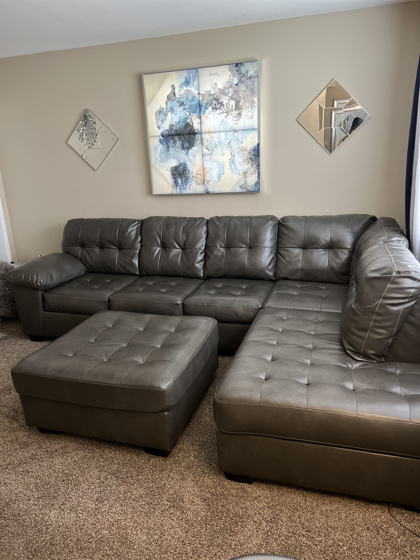 Nice Grey Leather Sectional With Ottoman