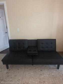 Black Faux Leather Futon Sofa with Cup Holders