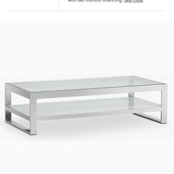Rectangle  Coffee Table, Heavy, was $1,100. Stainless Steel Frame, Tempered Glass, Perfect Condition Size: 55W x 15H x 27.                      