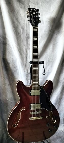 Brand new 335 style electric guitar with new bag