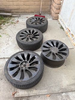 Tesla rims/ 3 tires