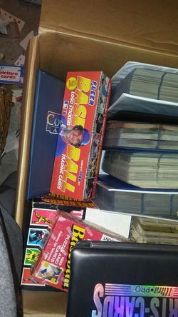 Baseball cards sets and unopened packs