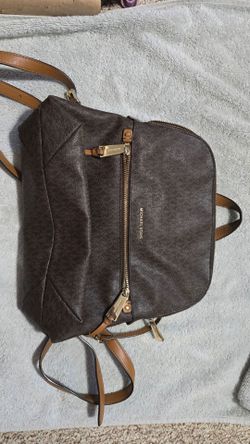 Dark brown leather backpack