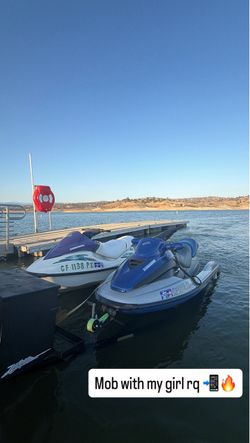 2 seadoo Jetski and dual trailer